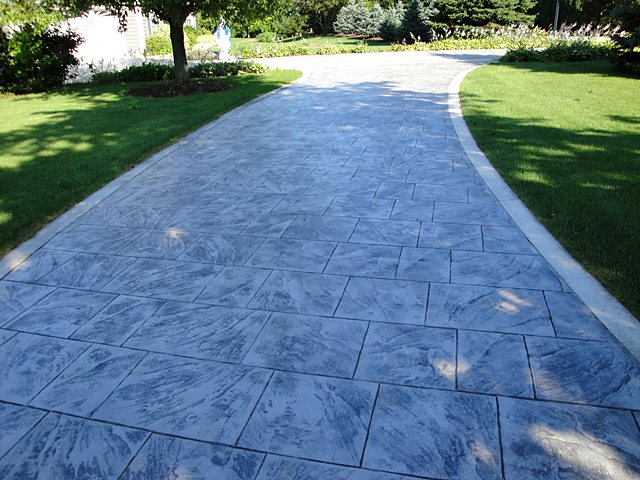 Grey slate pattern stamped concrete driveway